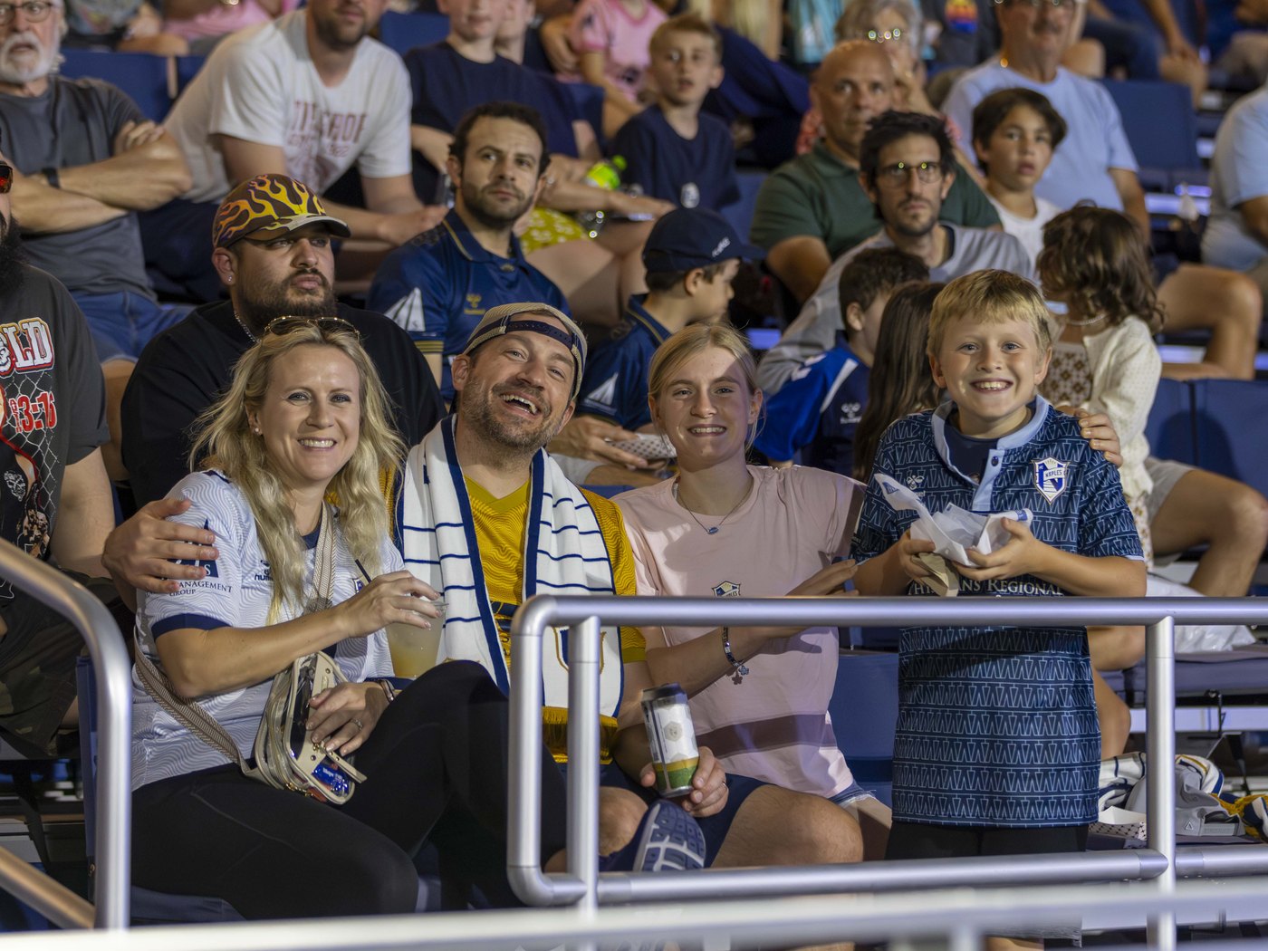 FC Naples supporters cheering in the stands