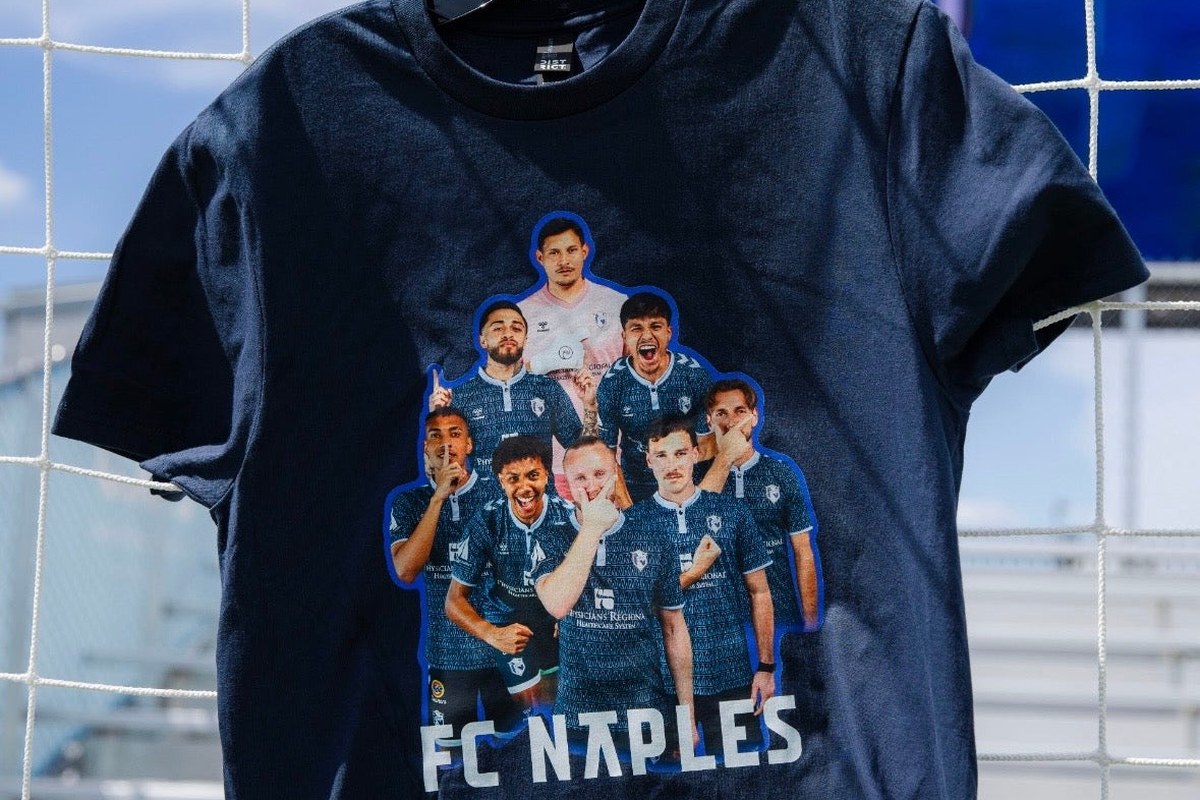Club scarves, jerseys and caps displayed in the official shop